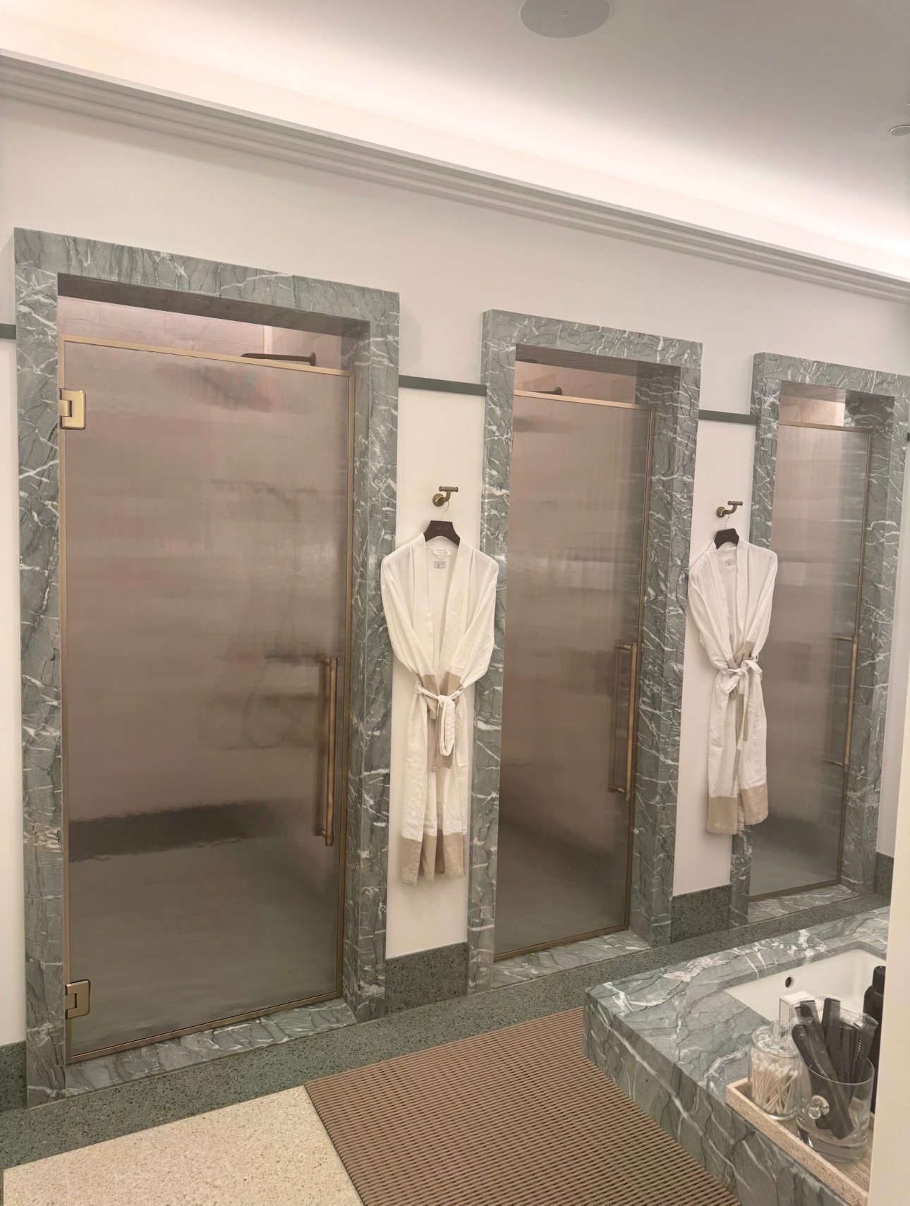 Custom glass sauna doors installed in a commercial interior