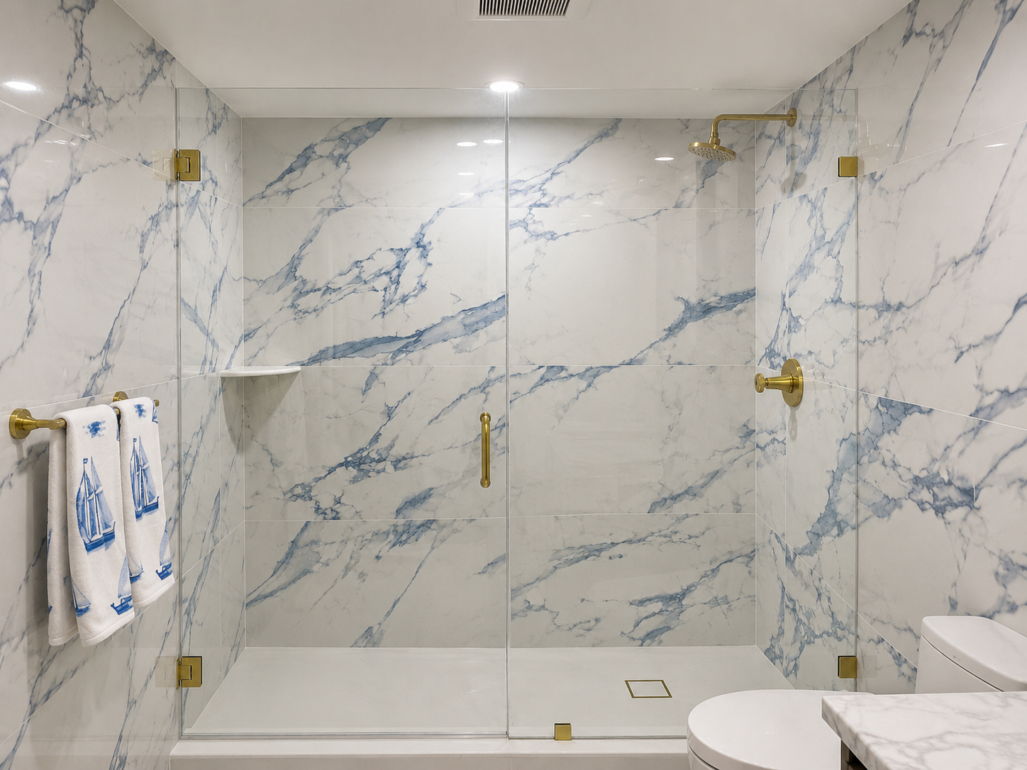 Floor-to-ceiling frameless glass shower enclosure